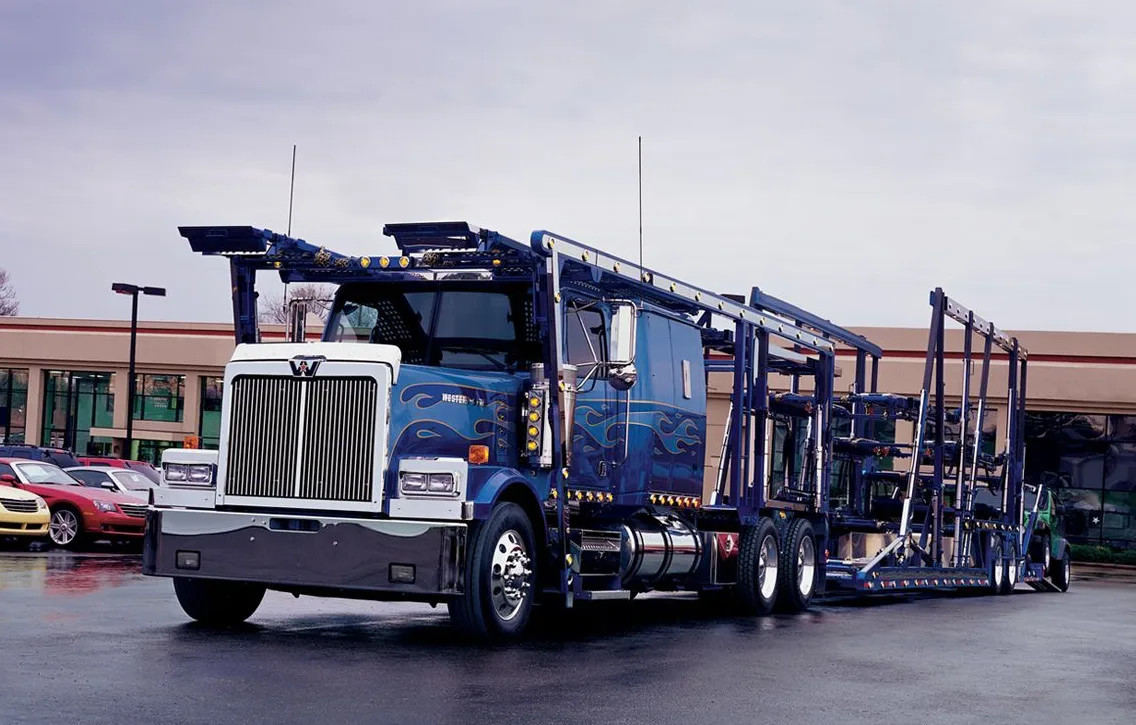 Tracking a vehicle on an open transport carrier