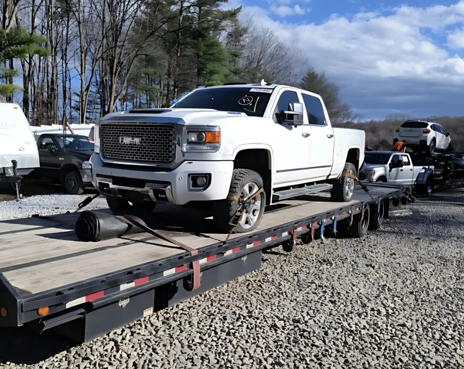 Multi-car carrier loaded with vehicles for nationwide auto transport by Bronco Car Hauling